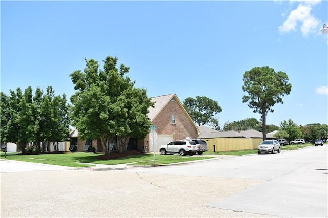 14 Platt St, Kenner, LA 70065 - view of front of property with a front yard and brick siding