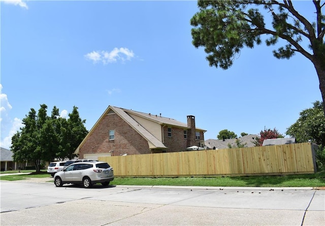 14 Platt St, Kenner, LA 70065 - view of side of home with brick siding