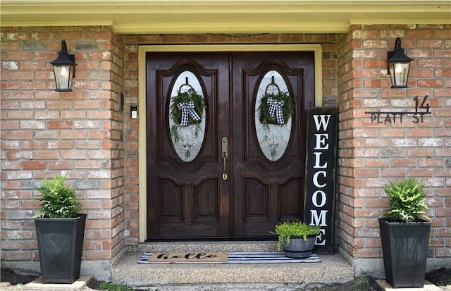 14 Platt St, Kenner, LA 70065 - doorway to property featuring brick siding