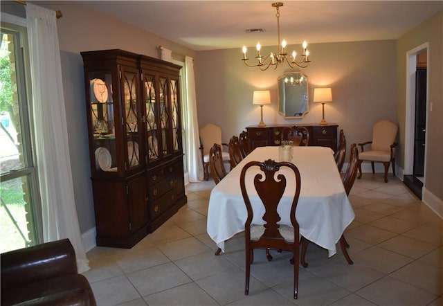 14 Platt St, Kenner, LA 70065 - dining space with a chandelier and light tile patterned floors