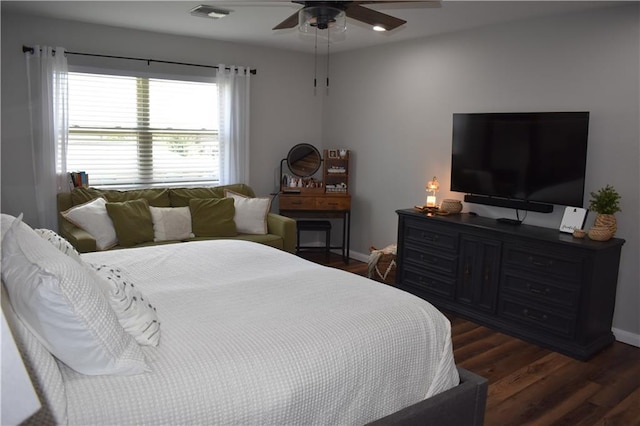 14 Platt St, Kenner, LA 70065 - bedroom with dark wood-style floors and a ceiling fan