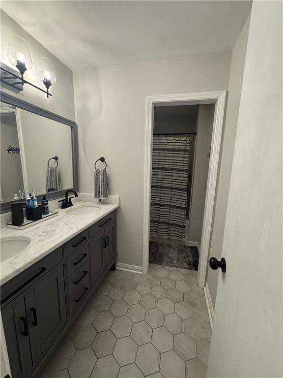 14 Platt St, Kenner, LA 70065 - full bath with double vanity and tile patterned flooring