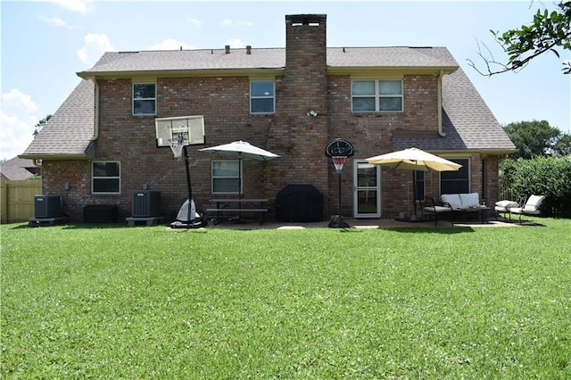 14 Platt St, Kenner, LA 70065 - rear view of property featuring an outdoor living space, a patio, and brick siding