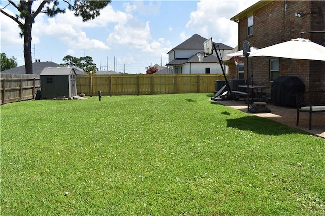 14 Platt St, Kenner, LA 70065 - fenced backyard with a shed and a patio