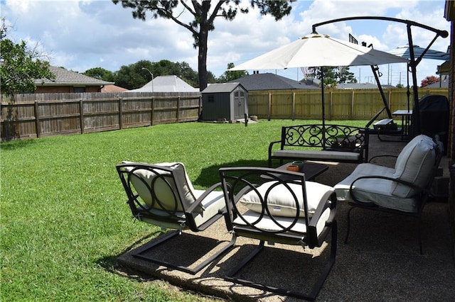 14 Platt St, Kenner, LA 70065 - fenced backyard with a storage unit and a patio