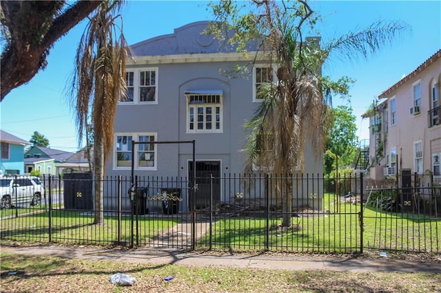3435 Louisiana Avenue Parkway, New Orleans, LA 70115 - view of front of property featuring stucco siding and a fenced front yard