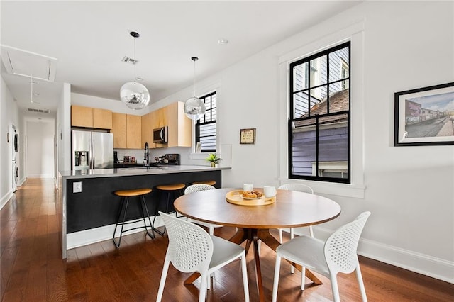 1039-41 Poland Ave, New Orleans, LA 70117 - dining space featuring attic access and dark wood finished floors