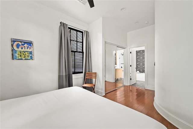 1039-41 Poland Ave, New Orleans, LA 70117 - bedroom featuring hardwood / wood-style floors and a ceiling fan