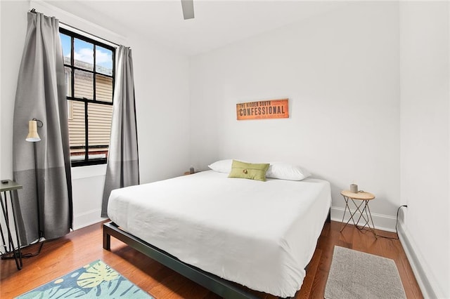 1039-41 Poland Ave, New Orleans, LA 70117 - bedroom featuring wood finished floors and ceiling fan