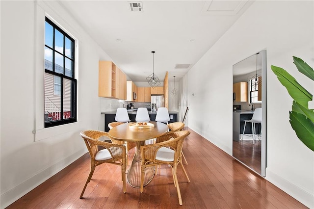 1039-41 Poland Ave, New Orleans, LA 70117 - dining room with plenty of natural light and wood-type flooring