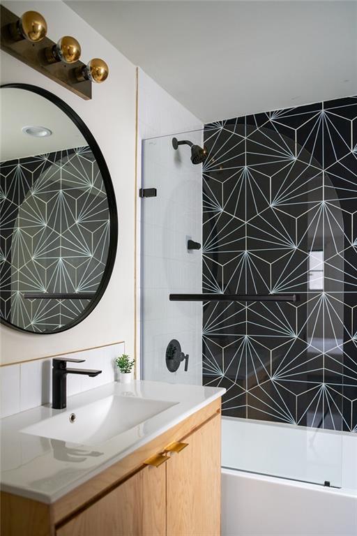 1039-41 Poland Ave, New Orleans, LA 70117 - full bath featuring vanity and  shower combination