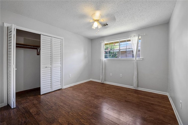 905 Rue Rochelle, Slidell, LA 70458 - unfurnished bedroom with wood finished floors, a textured ceiling, a closet, and ceiling fan