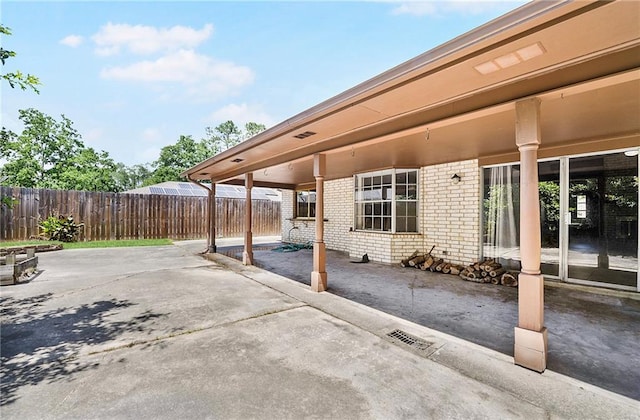 905 Rue Rochelle, Slidell, LA 70458 - view of patio with a carport