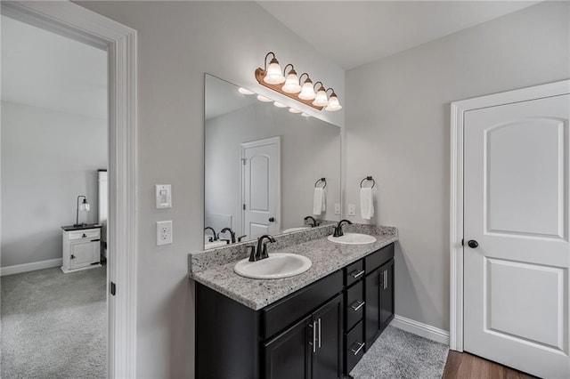 42016 Wood Ave, Ponchatoula, LA 70454 - bathroom with double vanity and baseboards