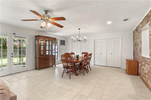 4720 Sheridan Ave, Metairie, LA 70002 - dining area featuring brick wall, a chandelier, ceiling fan, a textured ceiling, and french doors