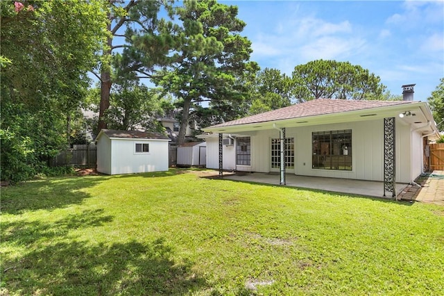 4720 Sheridan Ave, Metairie, LA 70002 - rear view of house featuring a storage shed, a fenced backyard, a patio, and a chimney