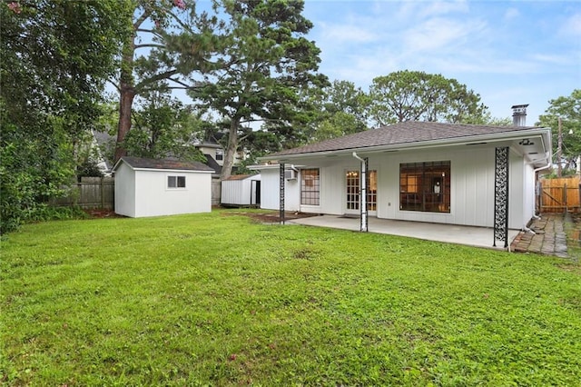 4720 Sheridan Ave, Metairie, LA 70002 - back of house with a shed, a patio, a fenced backyard, and a chimney