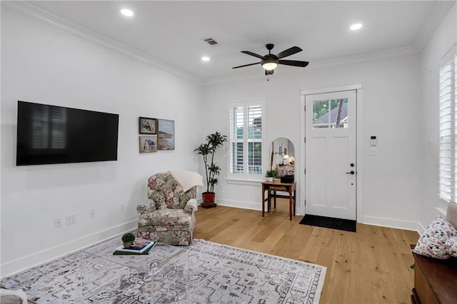 5756 Warrington Dr, New Orleans, LA 70122 - foyer entrance featuring light wood finished floors, crown molding, a ceiling fan, and recessed lighting
