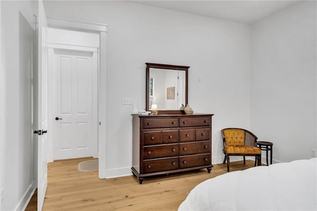 5756 Warrington Dr, New Orleans, LA 70122 - bedroom with light wood-style floors and baseboards