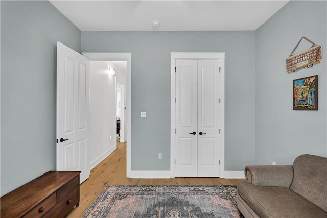 5756 Warrington Dr, New Orleans, LA 70122 - bedroom featuring light wood finished floors and a closet