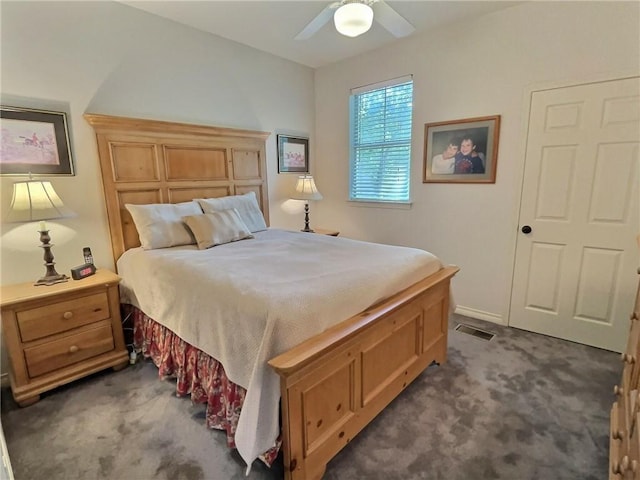 1217 W 15th Ave, Covington, LA 70433 - bedroom featuring dark colored carpet and ceiling fan