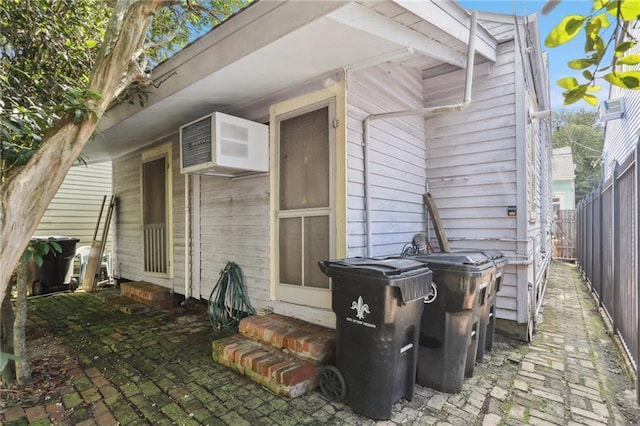 720 Port St, New Orleans, LA 70117 - rear view of property with entry steps and a fenced backyard