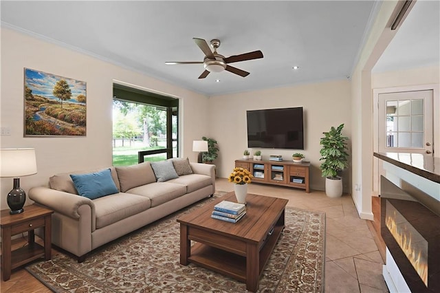 2549 Villere St, Mandeville, LA 70448 - living room with a ceiling fan, ornamental molding, light tile patterned floors, and recessed lighting