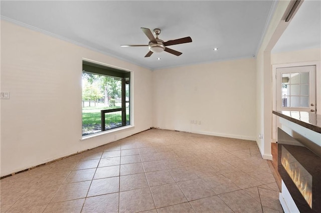 2549 Villere St, Mandeville, LA 70448 - tiled spare room with ornamental molding, ceiling fan, and recessed lighting