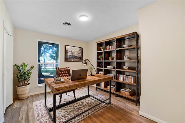 2549 Villere St, Mandeville, LA 70448 - office area featuring wood finished floors and baseboards