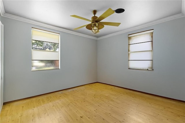 2549 Villere St, Mandeville, LA 70448 - empty room featuring light wood finished floors, ornamental molding, and a ceiling fan