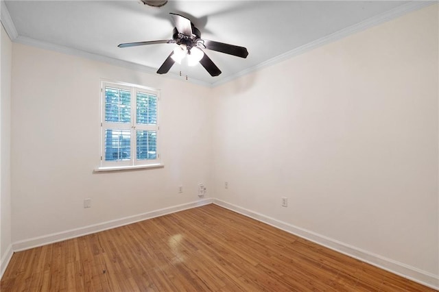 2549 Villere St, Mandeville, LA 70448 - spare room featuring light wood finished floors, a ceiling fan, and crown molding