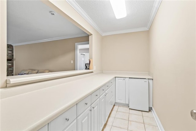 3540 Silver Maple Ct, New Orleans, LA 70131 - bar with ornamental molding, light tile patterned floors, refrigerator, and a textured ceiling