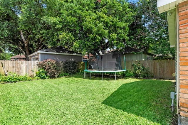 3540 Silver Maple Ct, New Orleans, LA 70131 - fenced backyard with a trampoline