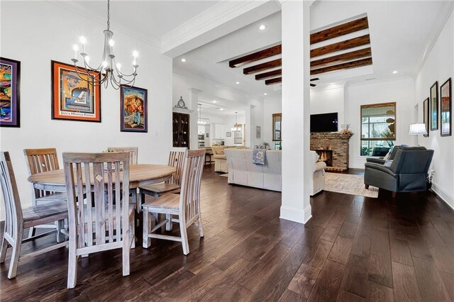 225 Chateau Papillon, Mandeville, LA 70471 - dining room featuring hardwood / wood-style flooring, recessed lighting, a stone fireplace, beamed ceiling, and crown molding