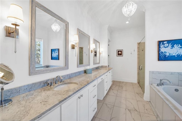225 Chateau Papillon, Mandeville, LA 70471 - bathroom with marble look tile flooring, a stall shower, a bath, double vanity, and a chandelier