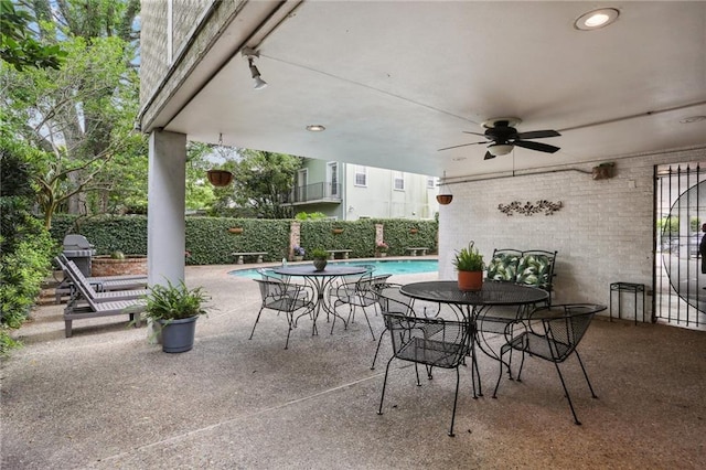 2511 St Charles Ave Unit 302, New Orleans, LA 70130 - view of patio featuring a ceiling fan and outdoor dining area