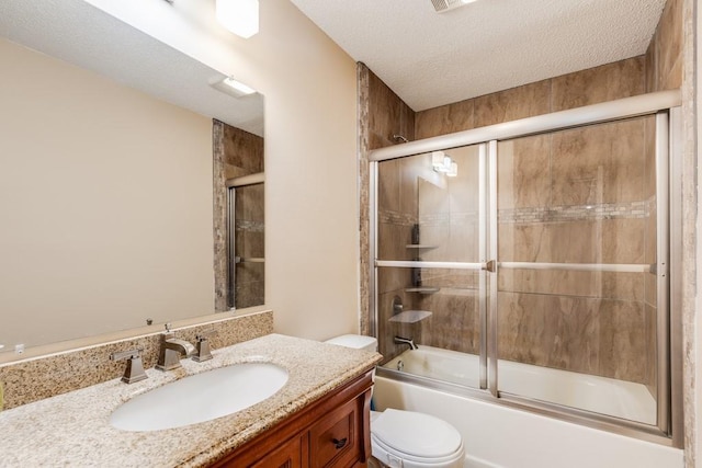 122 Warwick St, La Place, LA 70068 - full bath featuring vanity, bath / shower combo with glass door, and a textured ceiling