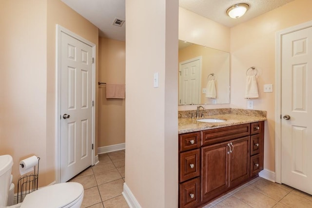 122 Warwick St, La Place, LA 70068 - bathroom with tile patterned flooring and vanity