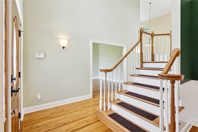89 Catalpa Trce, Covington, LA 70433 - staircase with wood finished floors and baseboards