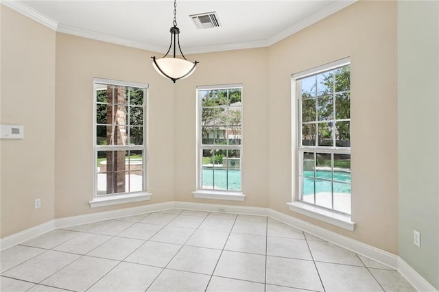 89 Catalpa Trce, Covington, LA 70433 - unfurnished dining area featuring ornamental molding and light tile patterned flooring