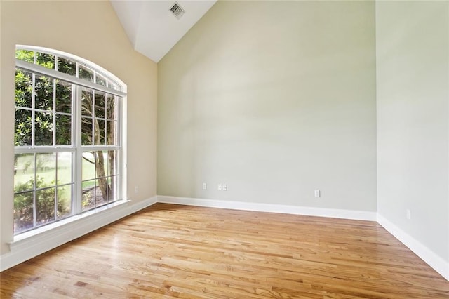 89 Catalpa Trce, Covington, LA 70433 - empty room with plenty of natural light, light wood-style floors, and lofted ceiling