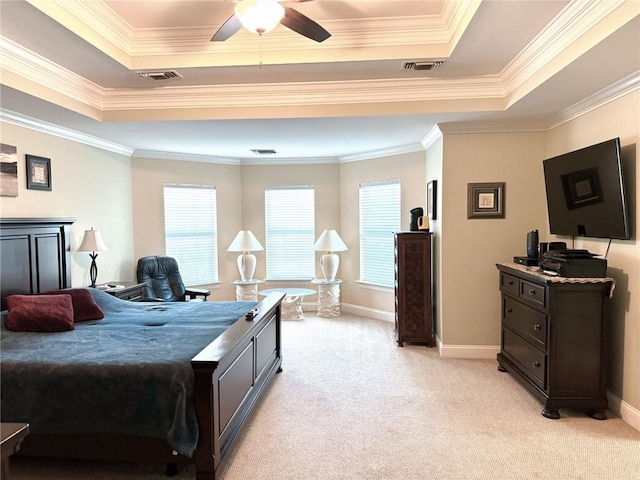 89 Catalpa Trce, Covington, LA 70433 - bedroom featuring a tray ceiling, light colored carpet, crown molding, and a ceiling fan