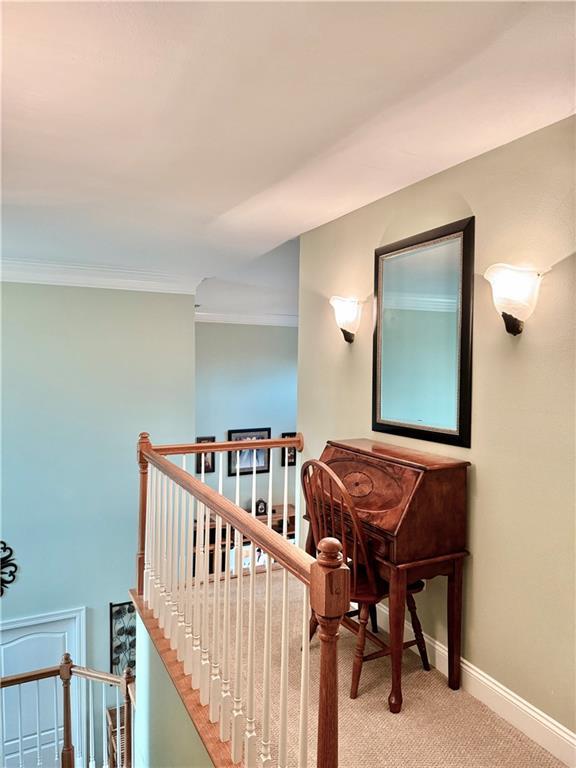 89 Catalpa Trce, Covington, LA 70433 - stairs featuring carpet and ornamental molding