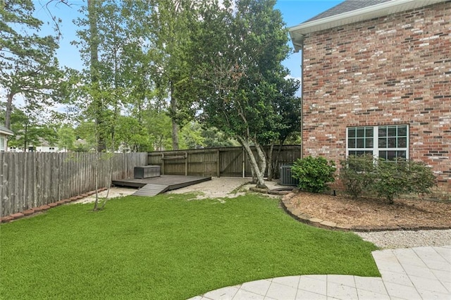 89 Catalpa Trce, Covington, LA 70433 - fenced backyard featuring a deck