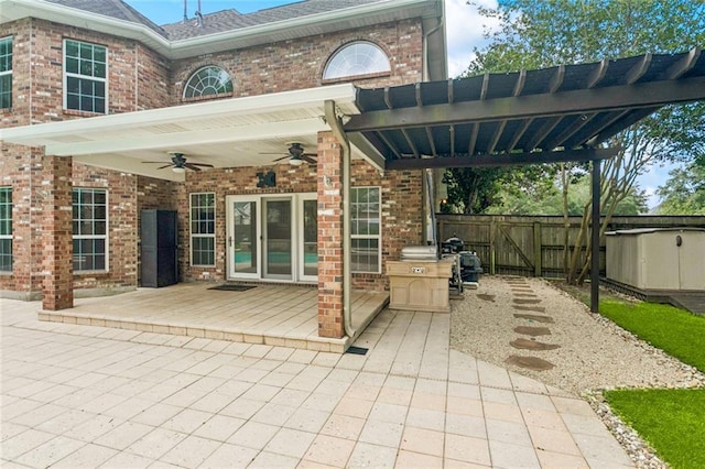 89 Catalpa Trce, Covington, LA 70433 - view of patio featuring ceiling fan, a gate, and a deck