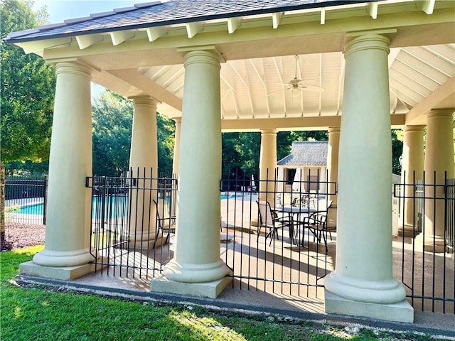 89 Catalpa Trce, Covington, LA 70433 - view of patio / terrace with ceiling fan, a community pool, and outdoor dining space
