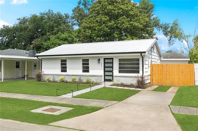 300 Florida St, River Ridge, LA 70123 - view of front of home featuring a metal roof