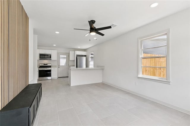 300 Florida St, River Ridge, LA 70123 - unfurnished living room with ceiling fan and recessed lighting
