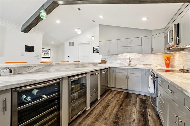 7720 Breakwater Dr, New Orleans, LA 70124 - kitchen with beverage cooler, appliances with stainless steel finishes, gray cabinetry, light stone counters, and ornamental molding