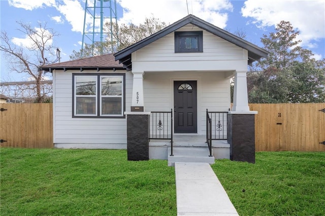 507 Westwego Ave, Westwego, LA 70094 - view of front facade featuring a shingled roof and covered porch